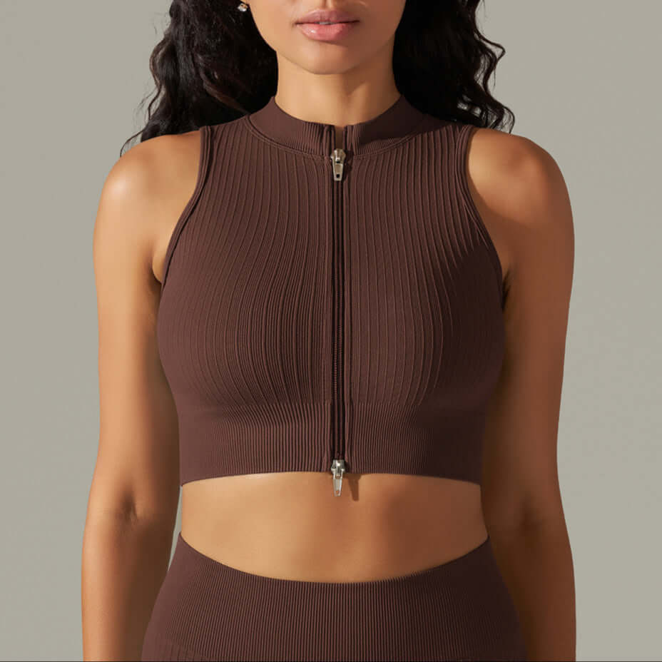 Brown seamless zip-up sports vest for women, designed for yoga and fitness, made from quick-drying stretch cotton blend.