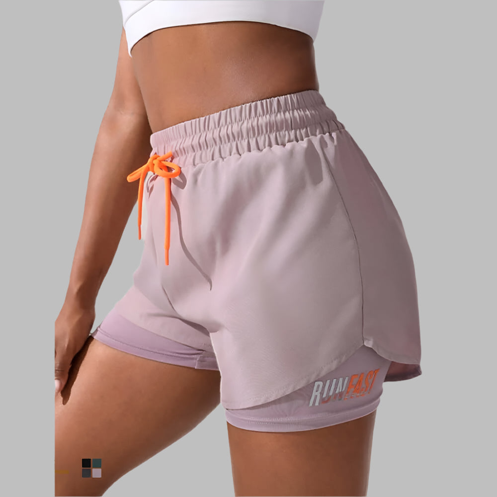 Woman wearing anti-exposure drawstring sports shorts, showcasing lightweight and comfortable fit, ideal for active workouts.