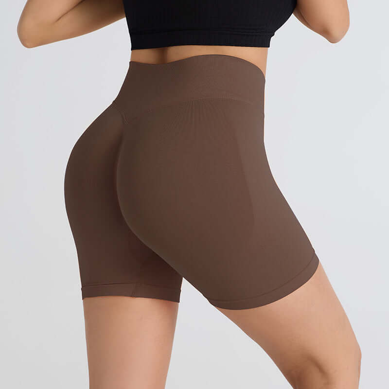 Women's booty-lifting sports shorts in brown, designed for enhanced fit and comfort, perfect for workouts and activewear.