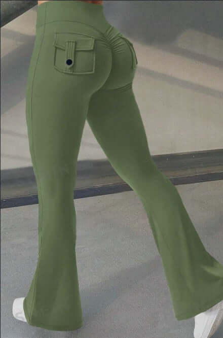 Green workout lifting leggings with rear pocket detail, designed for comfort and style during exercise.
