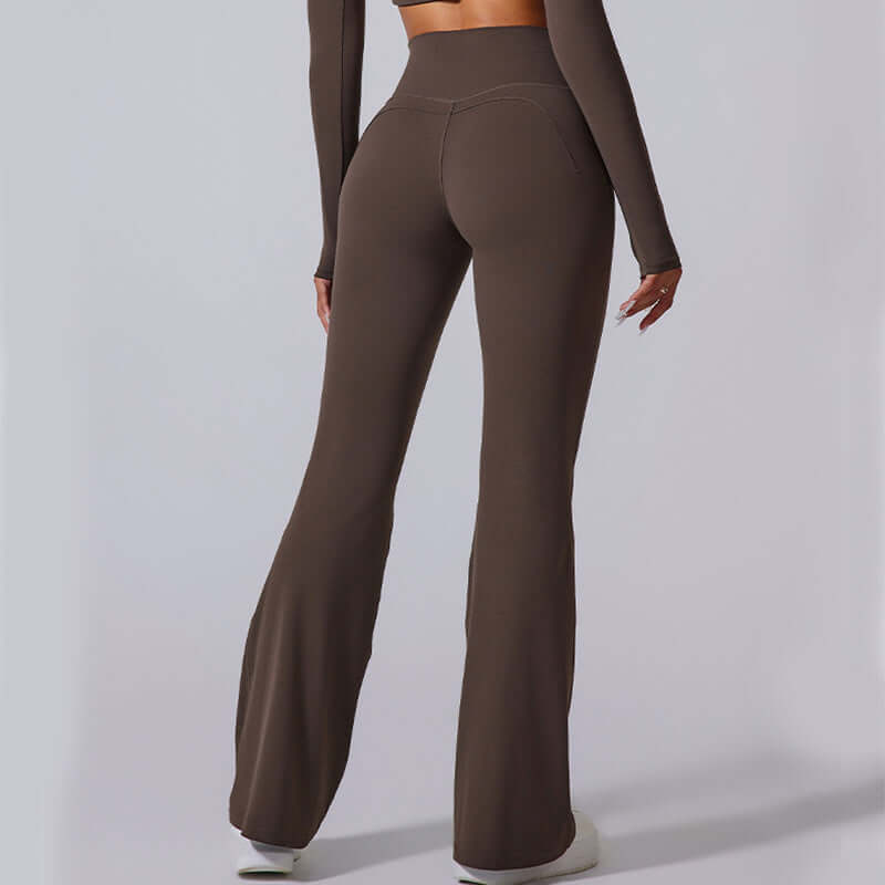 Back view of brown flared yoga pants showcasing fit and comfort from waistband to hem.