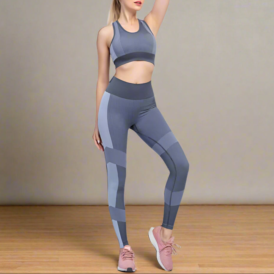 Gray seamless yoga set for women, showcasing breathable, flexible athletic wear for yoga and gym. Available in black, blue, gray.