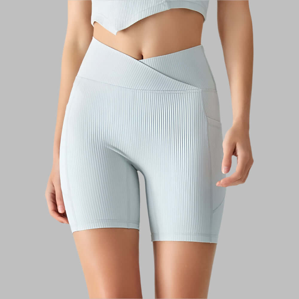 Light gray ribbed sport shorts for women, ideal for yoga and fitness, featuring spandex lining and high-waist design. Available in sizes S-XL.