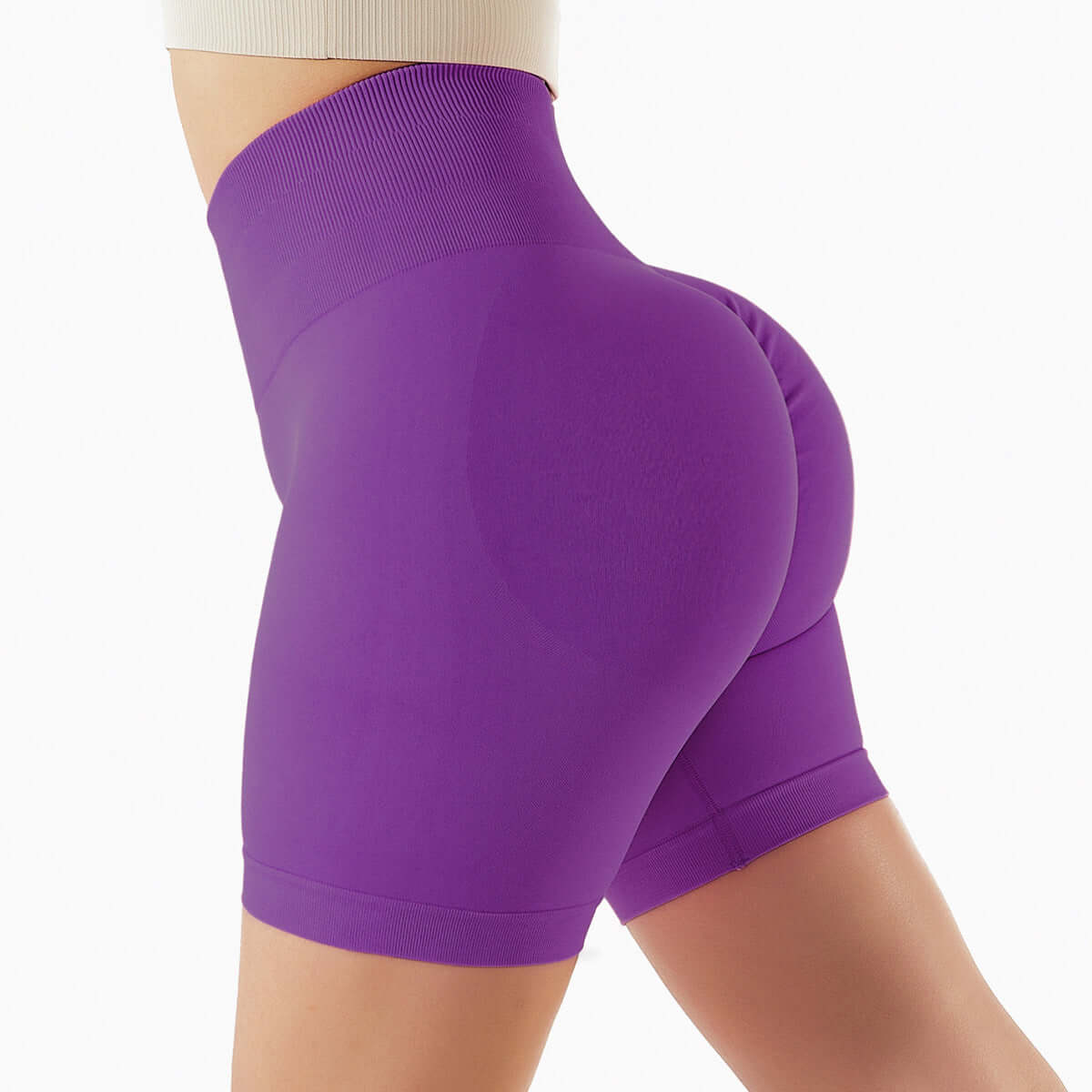 Purple seamless shorts with high waist design, highlighting comfort and style for active wear.
