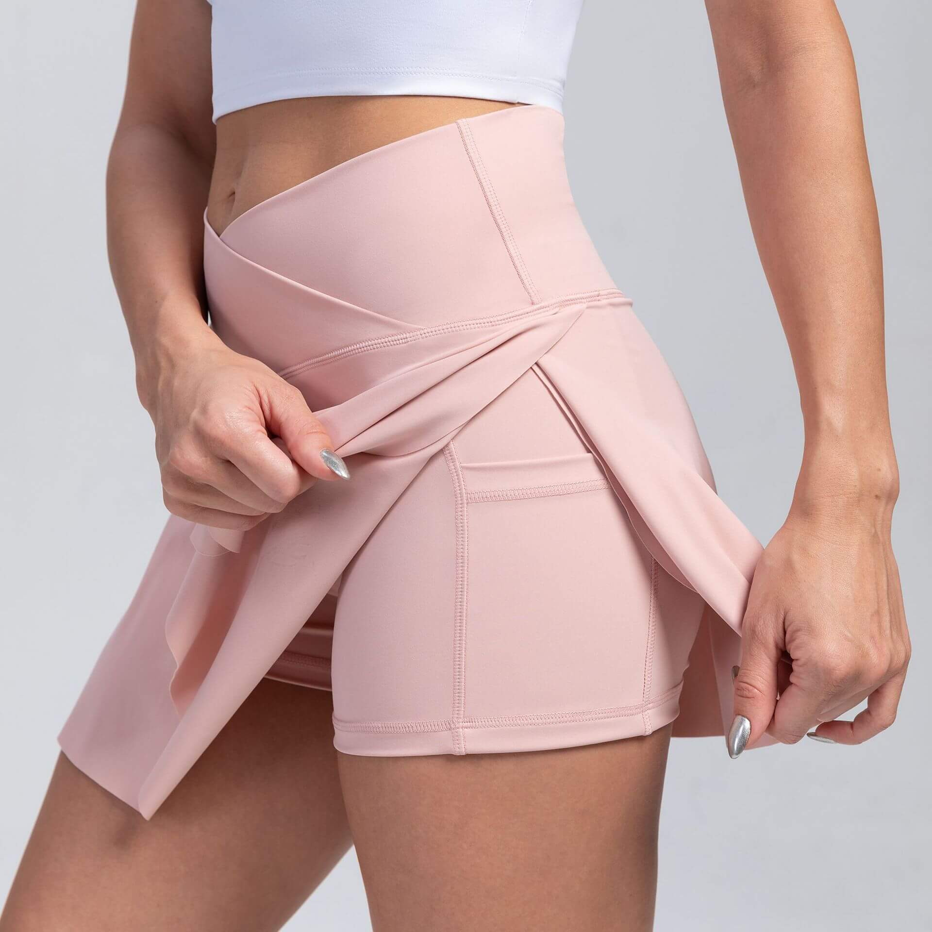 Sport Yoga Shorts with built-in skirt in solid color, moisture-wicking, flattering fit for women, suitable for all seasons.