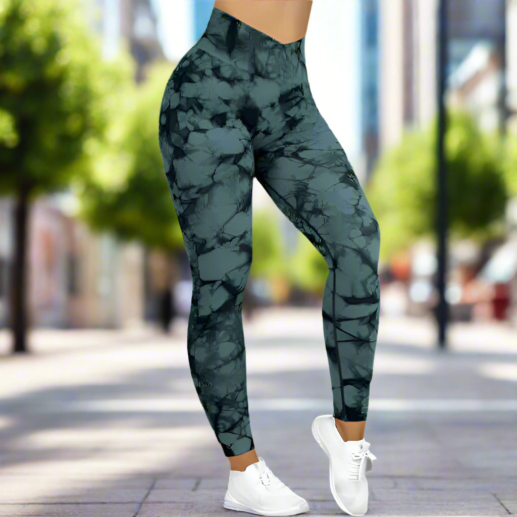 Stylish tie dye leggings with a gray and black pattern, highlighting comfortable fit and modern fashion aesthetics.