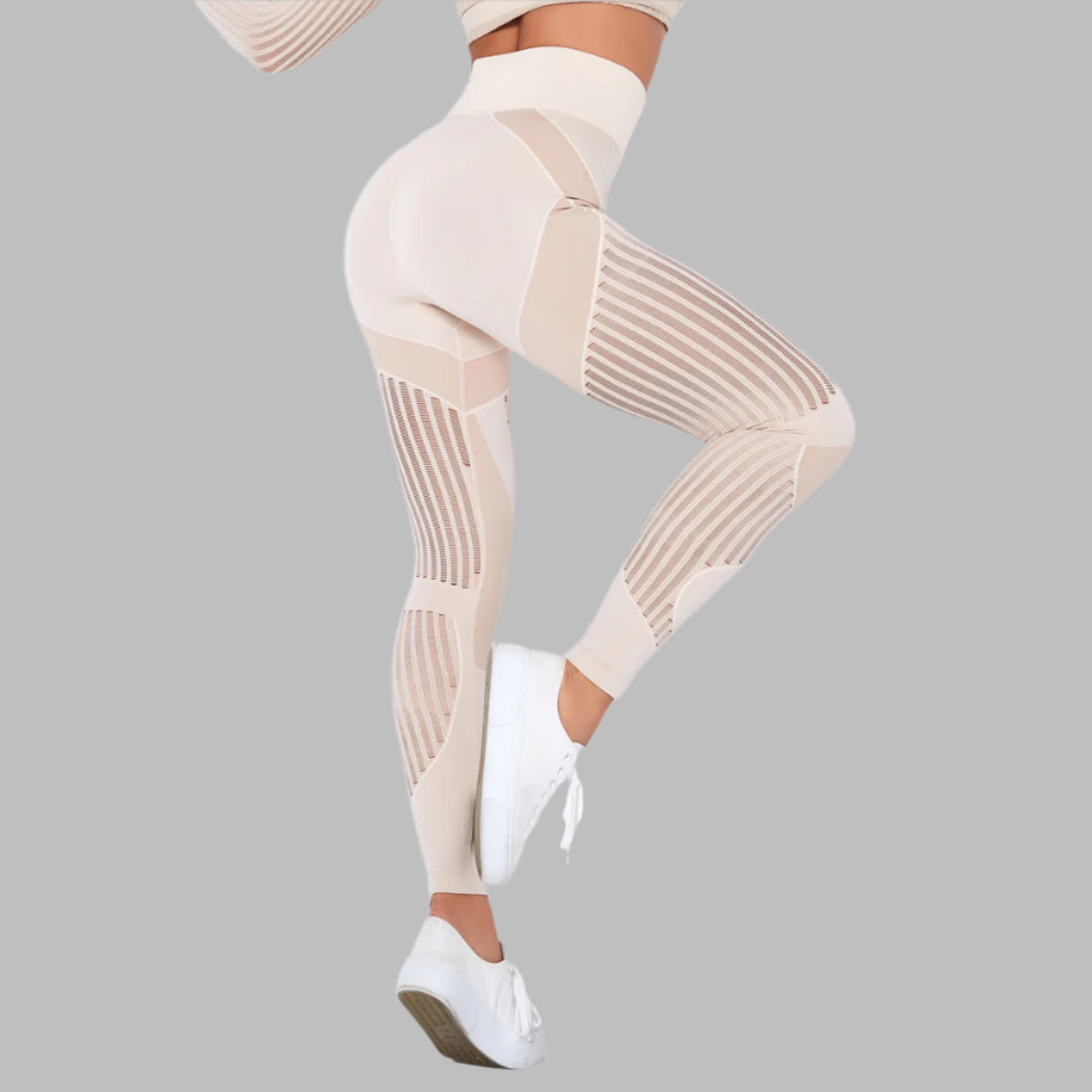 Shiny white high-waisted leggings showcasing sleek fit and modern style against a neutral background.