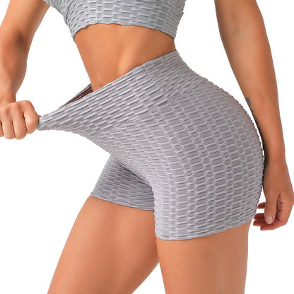 High waist shorts in textured gray fabric providing stretch and comfort, ideal for workouts and casual wear.