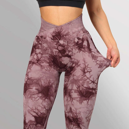 Brown tie dye leggings with high-waist and a unique blend pattern, showcasing stretch and fit for yoga or casual wear.