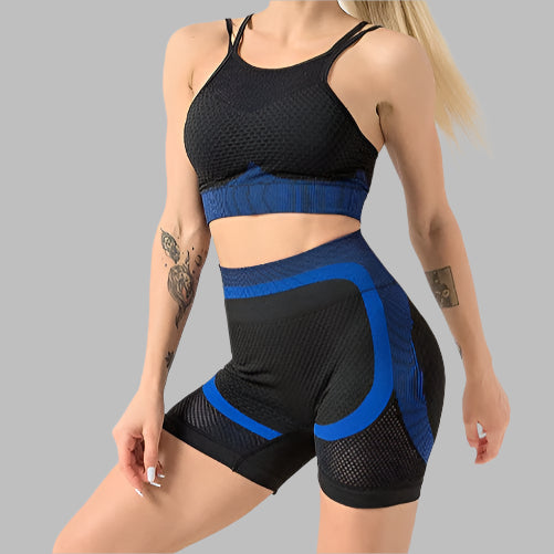 Women's black and blue gym set featuring a sports bra and high-waisted shorts, designed for workout comfort and style.