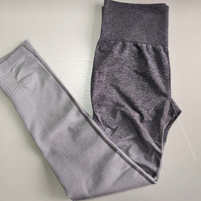 Grey yoga leggings for women, ideal for gym and sport activities, showcasing stretchy fabric.