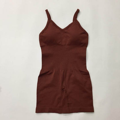 Seamless brown knit yoga jumpsuit made from organic cotton. Relaxed fit, breathable material for ultimate comfort.