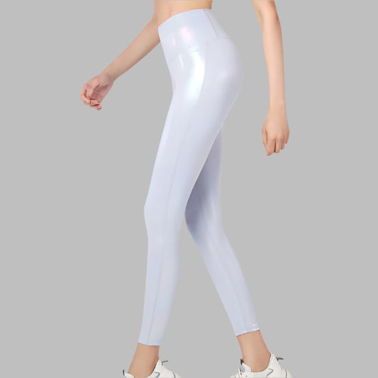 Woman wearing white embossed workout leggings, side view, demonstrating fit and style, suitable for gym and athletic activities.