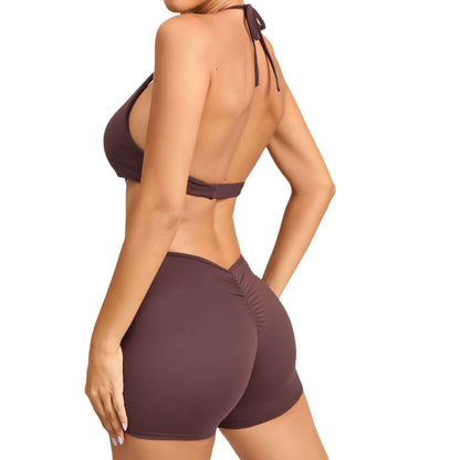 Brown two-piece fitness set made from organic cotton; features a relaxed fit and breathable material for comfort during workouts.