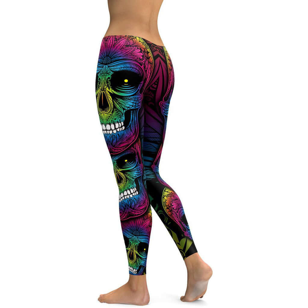 Colorful rainbow skull leggings featuring a vibrant design. Available in sizes S to 4XL, perfect for bold fashion statements.