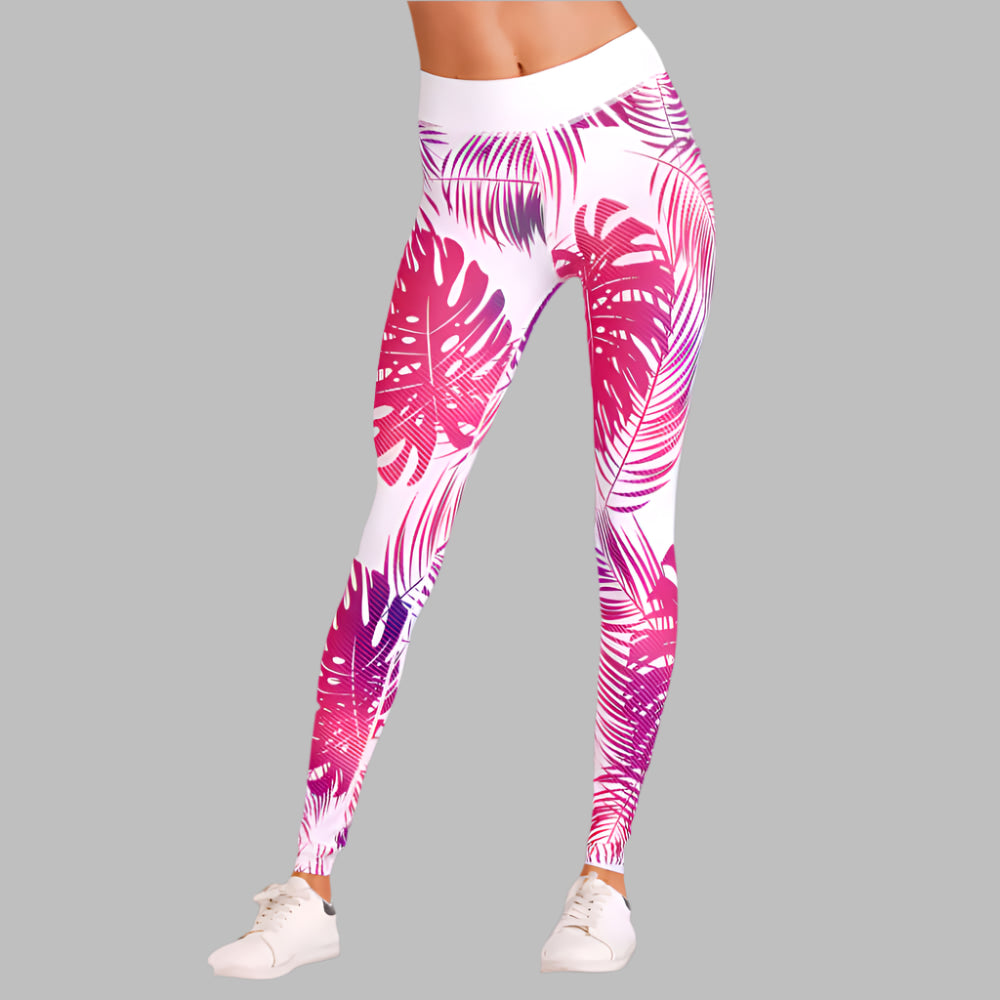 Women's red print yoga leggings with tropical leaf design on grey background, perfect for workouts and casual wear.