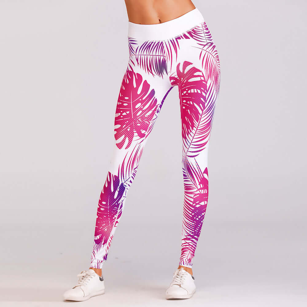 Red print yoga leggings with vibrant leaf pattern, perfect for stylish workout sessions.