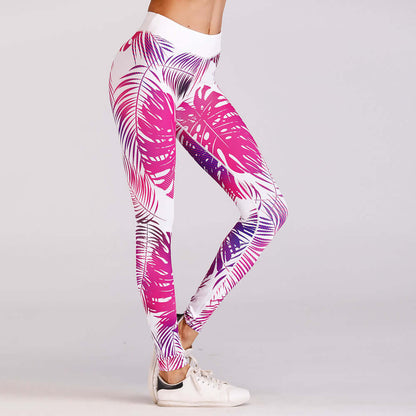 Woman wearing red and purple print yoga leggings with white sneakers, showcasing the vibrant pattern and fit.