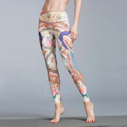 Woman wearing colorful printed yoga leggings standing in yoga pose on a mat, showcasing intricate floral and abstract patterns.