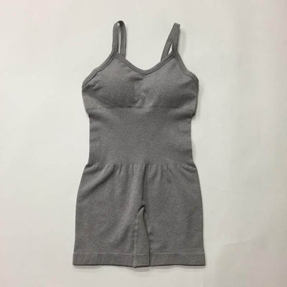 Seamless Knit Yoga Jumpsuit in gray. Made from organic cotton. Features a relaxed fit and breathable material for comfort.