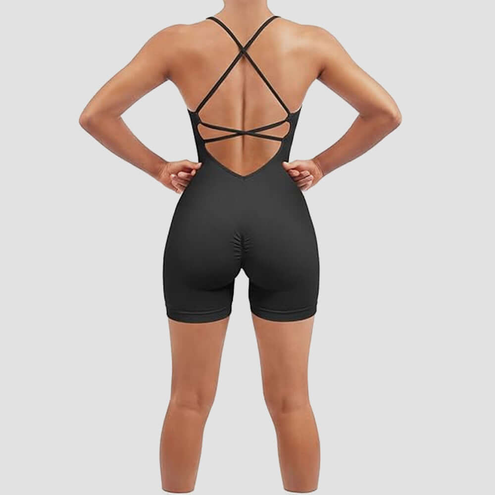 Back view of a seamless quick-dry fitness romper in black. Made from organic cotton with breathable material and a relaxed fit.