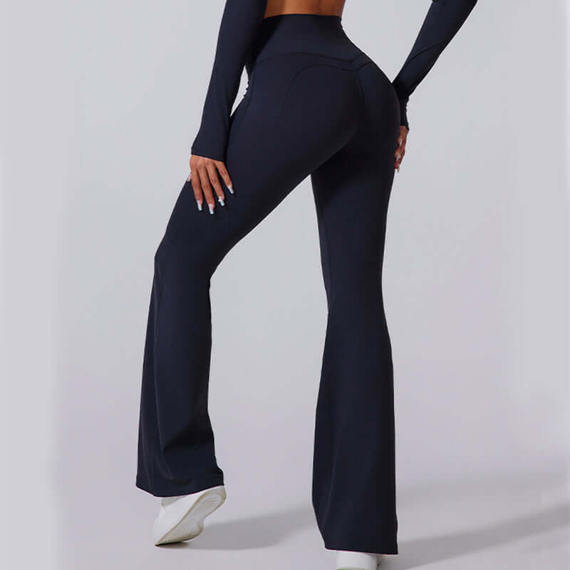 High-waisted black flared yoga pants showcasing a flattering fit and comfortable material, perfect for workouts or casual wear.