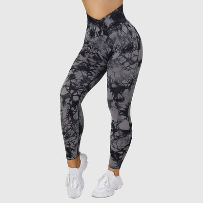 Women's high-waisted tie-dye leggings in black and gray, featuring a stylish abstract pattern, perfect for yoga and casual wear.