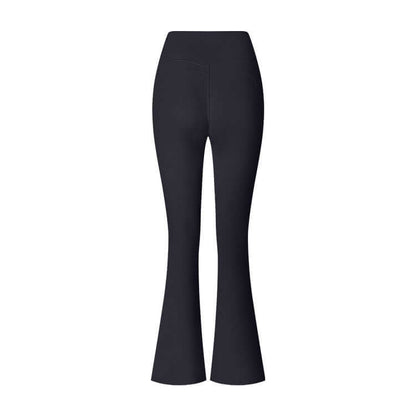 Back view of black flared yoga pants showcasing high-waisted design and flared hem, perfect for workouts and casual wear.