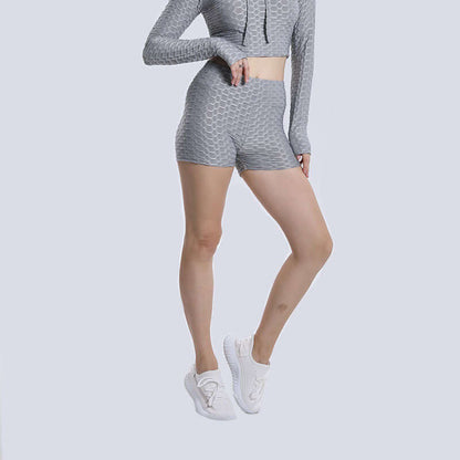 Grey high waist textured shorts with matching crop top, showcasing a stylish and comfortable activewear set for women.