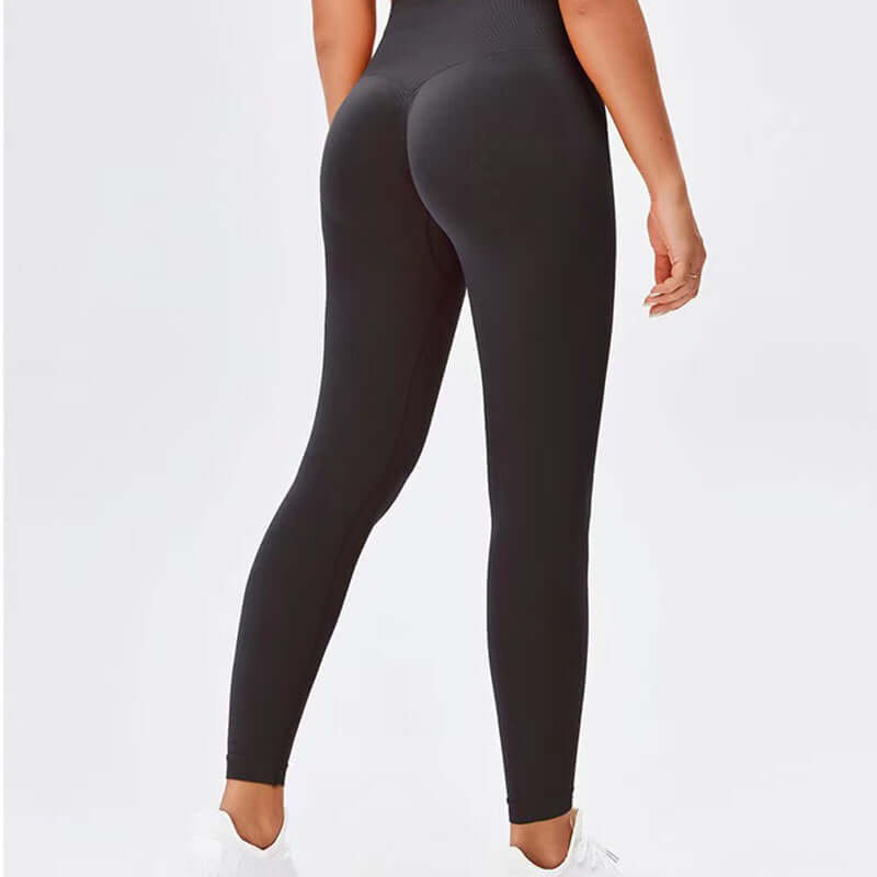 Rear view of black workout running leggings for women, available in sizes S, M, and L, ideal for fitness and exercise.