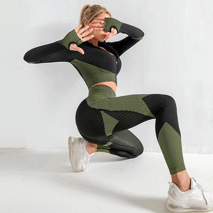 Woman wearing seamless leggings and crop top in a green and black design, performing a squat exercise.