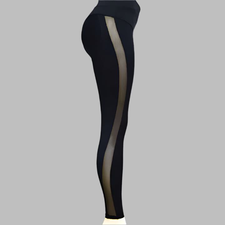 Black high waist yoga leggings with sheer side panel for women, elastic sport fit, side view on grey background.