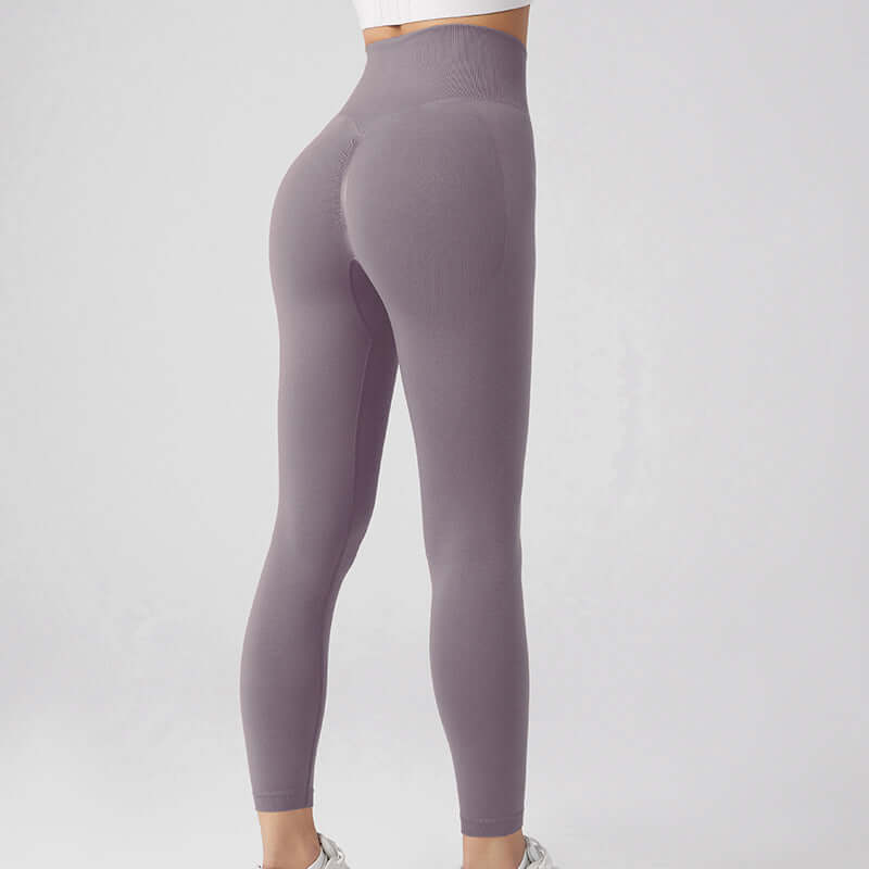 High-waisted workout running leggings in gray, available in sizes S, M, and L, designed for comfort and performance.