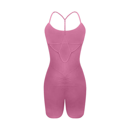 Sporty yoga bodysuit in pink. Made from organic cotton. Features a relaxed fit and breathable material for comfort.