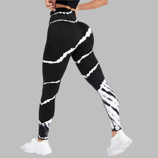 Black and white tie-dye compression workout pants for women, high-waisted, full-length leggings with a comfortable fit.