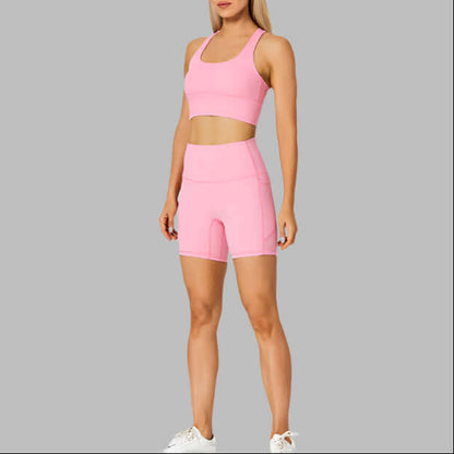 Women's pink outdoor sport set with crop top and shorts, perfect for exercise and fitness