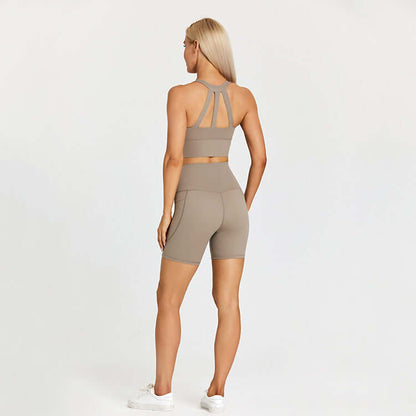 Woman wearing beige athletic outfit for outdoor sports