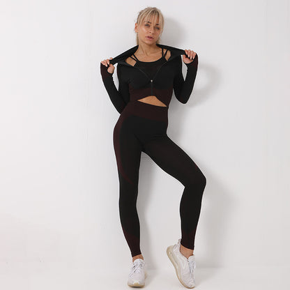 Model wearing black seamless leggings, crop top, and bra, showcasing stylish and comfortable activewear for women.