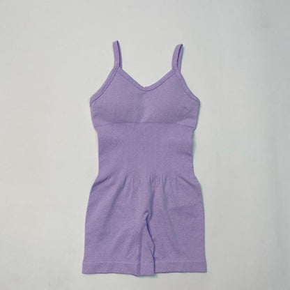 Lavender seamless knit yoga jumpsuit made of organic cotton. Offers relaxed fit and breathable material.