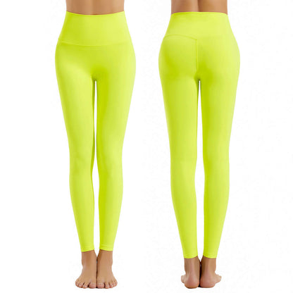 Bright yellow activewear sports leggings, tight fit, ultra-soft nylon fabric, ideal for workouts or yoga.