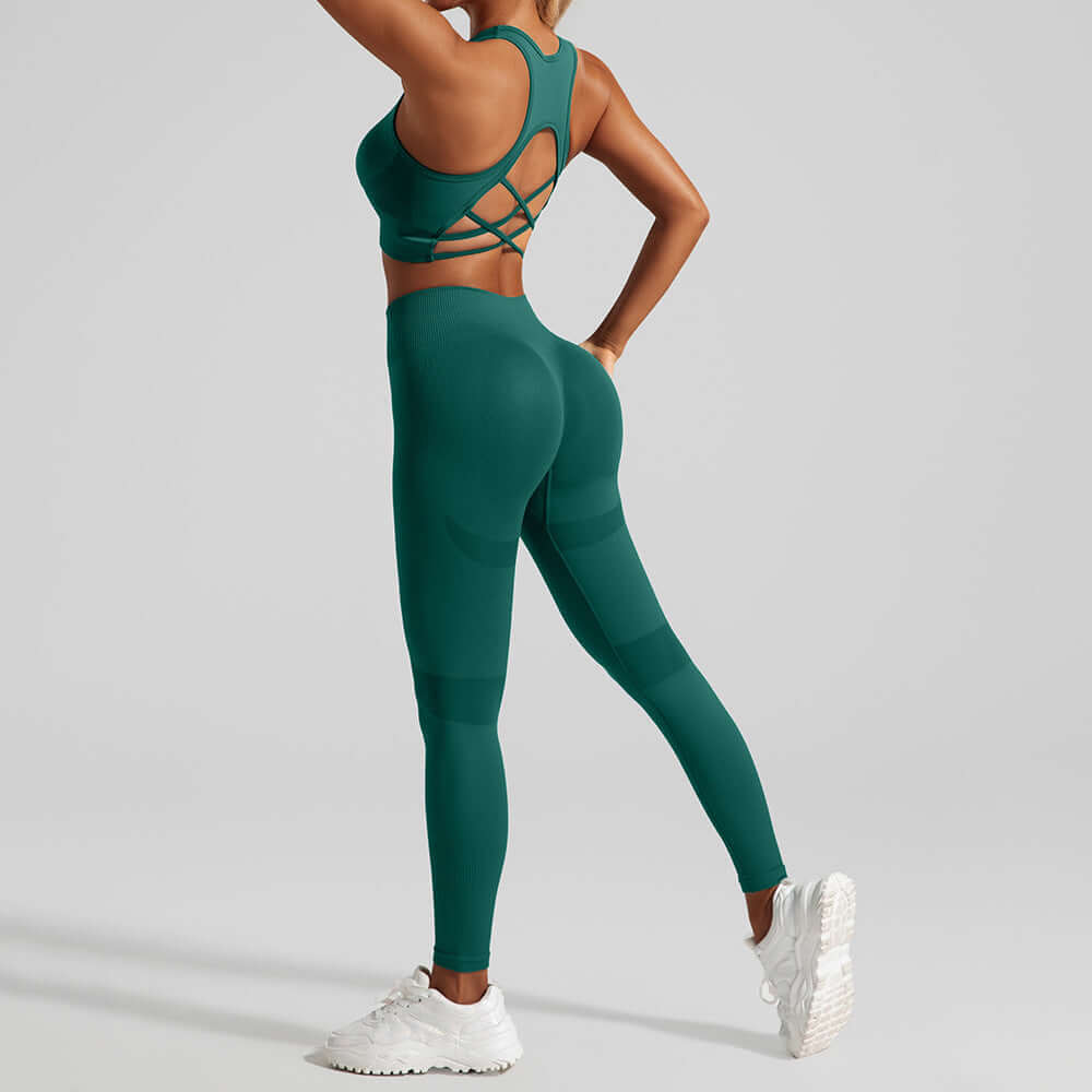 Green hip lifting sport leggings and yoga top for fitness.