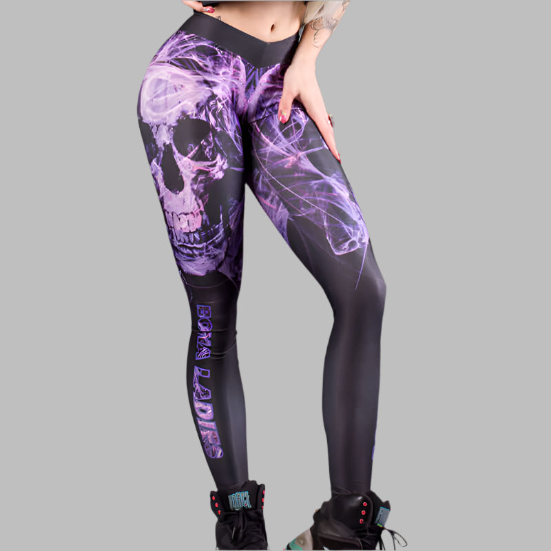 Woman wearing skull print leggings with purple and black design, showcasing alternative fashion style.