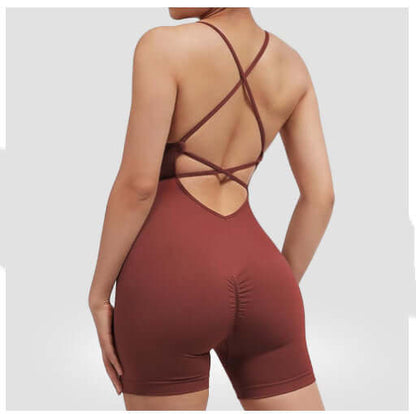 Back view of a seamless quick-dry fitness romper. Features organic cotton, relaxed fit, and breathable material.