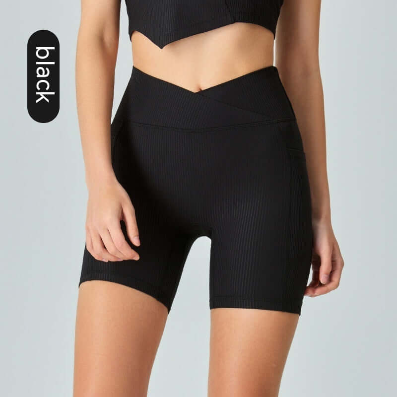 Black ribbed sport shorts for women, perfect for yoga and fitness, available in sizes S to XL, made with spandex for a flexible fit.