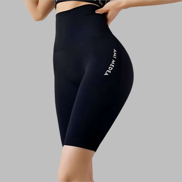 Women's seamless gym shorts offering a stretchy, comfortable fit, ideal for yoga and workouts, featuring branded activewear design.