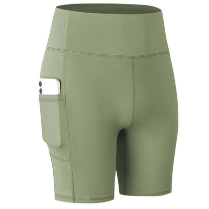 Green pocket sport shorts with phone holder design, featuring high waist and comfortable fit ideal for workouts and daily wear.