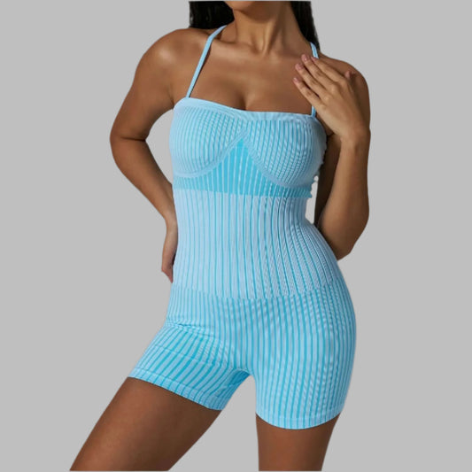 Ribbed strappy bodysuit in blue. Made from organic cotton. Offers a relaxed fit. Features breathable material for comfort.