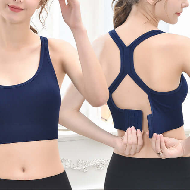 Navy crossback sports bra with adjustable straps and open-back design, ideal for support and comfort. Available in S, M, L, XL.