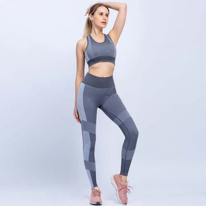 Gray seamless yoga set for women, showcasing breathable, flexible athletic wear for yoga and gym. Available in black, blue, gray.