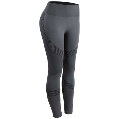 High waist yoga pants in dark gray with textured strip design, ideal for comfort and style during workouts and casual wear.